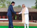 India's Prime Minister Narendra Modi and Prime Minister Justin Trudeau shake hands on the sidelines of the G20 summit in New Delhi on September 10, 2023.