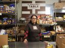 Yesmil Pena, who works at St. Philip Neri's Table Food Bank at St Philip Neri Church, is photographed in Toronto, Friday, Oct. 25, 2024.