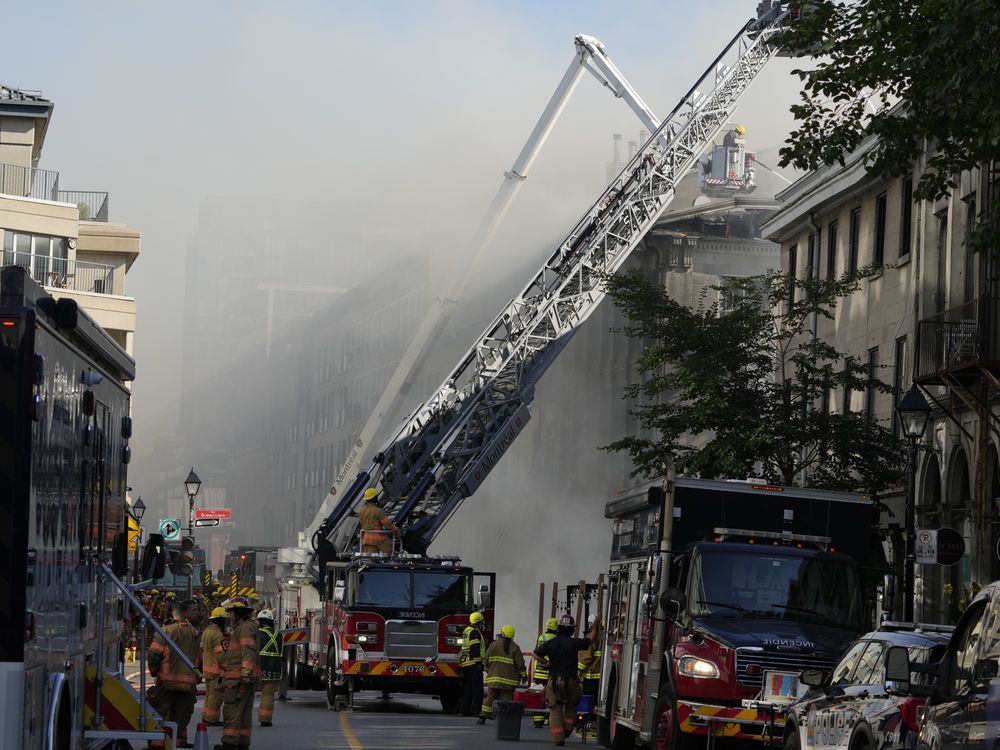 NextImg:Old Montreal fire under control, 2 bodies pulled from rubble, 40 people evacuated