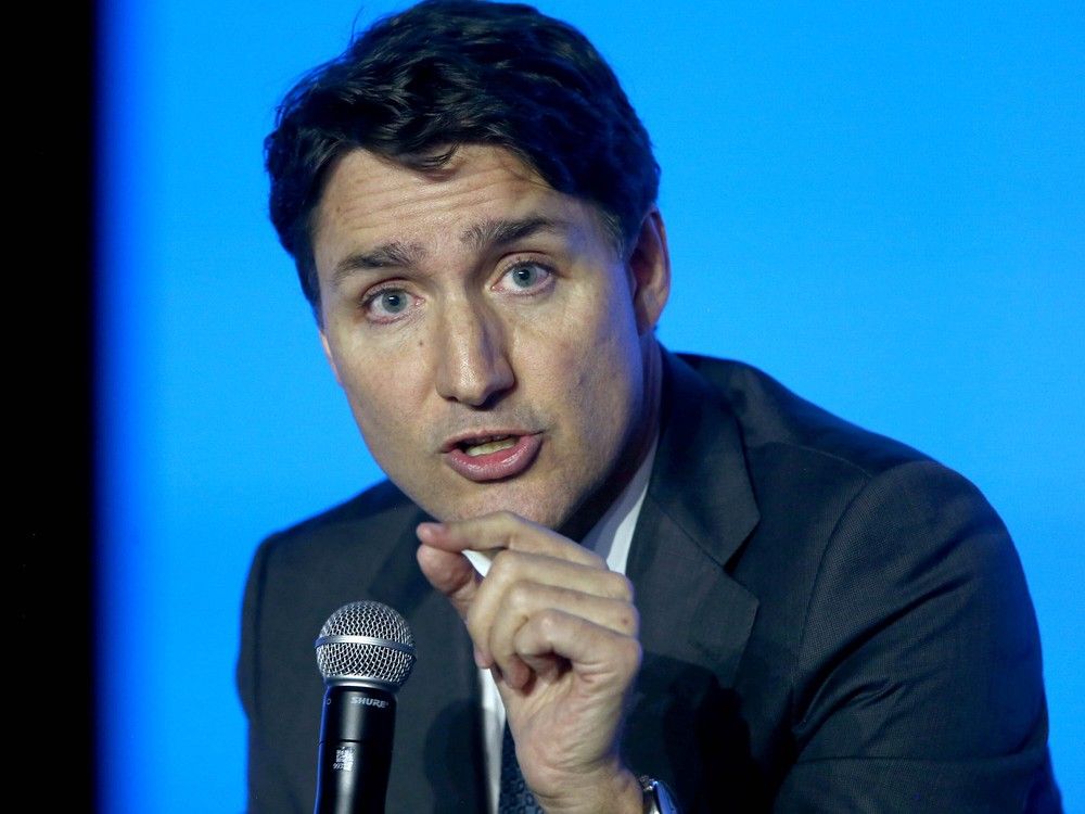 NextImg:Trudeau to meet with all premiers following Trump's 25% tariff threat