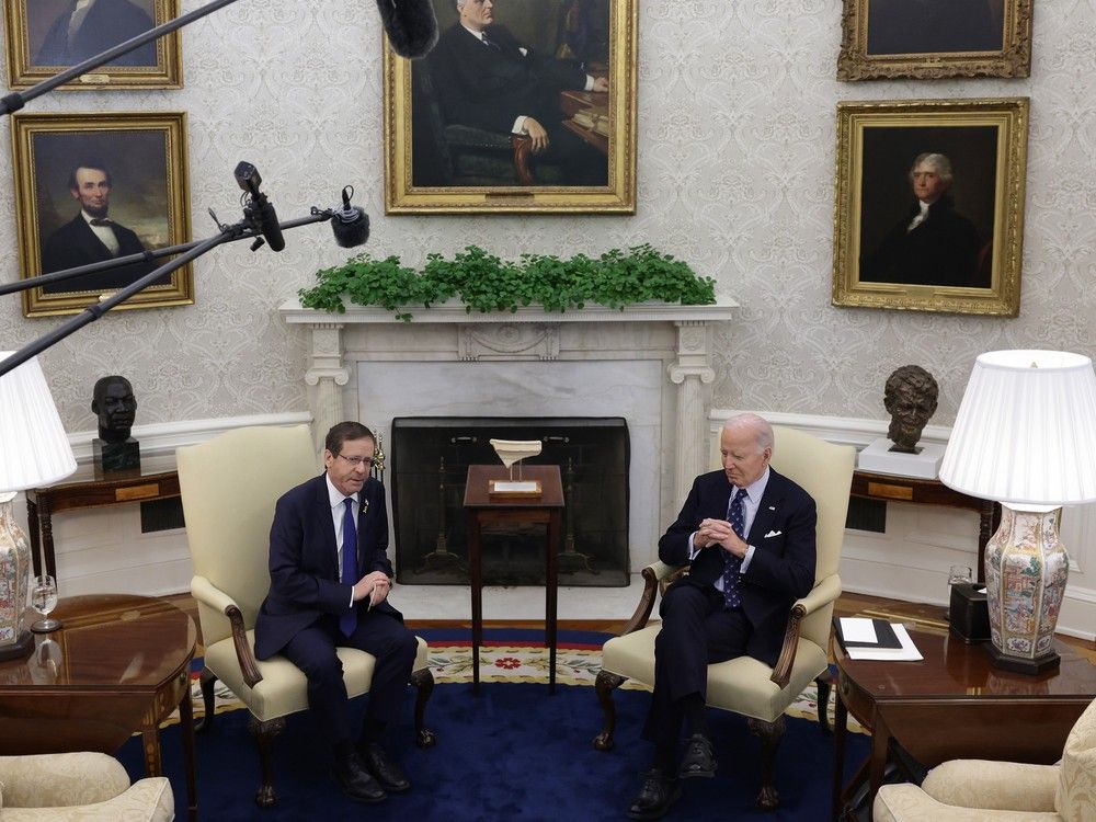 NextImg:Israeli president meets with Biden, reminds him 101 hostages still 'going through hell' in Gaza