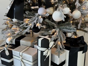 Co-ordinated giftware adds a sophisticated touch to a black-and-white tree.