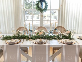This simple holiday dining room setting features pieces from Tori Wesszer.