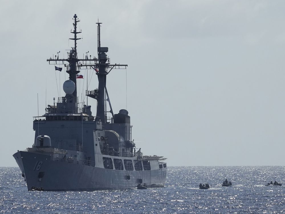 NextImg:Philippine military holds South China Sea combat drills as Chinese navy watches
