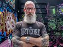 City Councillor Sterling Downey amid the graffiti/mural art behind Les Foufounes Electriques in Montreal on Aug. 20, 2023.
