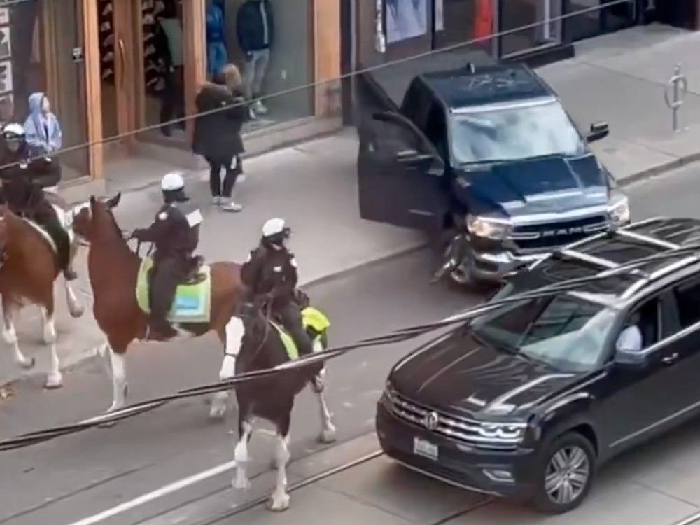 NextImg:Video shows alleged stolen vehicle in Toronto striking police horse, 3 cruisers before crashing