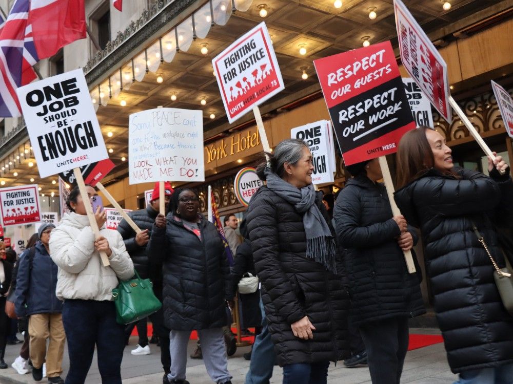 NextImg:Workers from Fairmont Royal York rally in Toronto as fans flood downtown for Taylor Swift