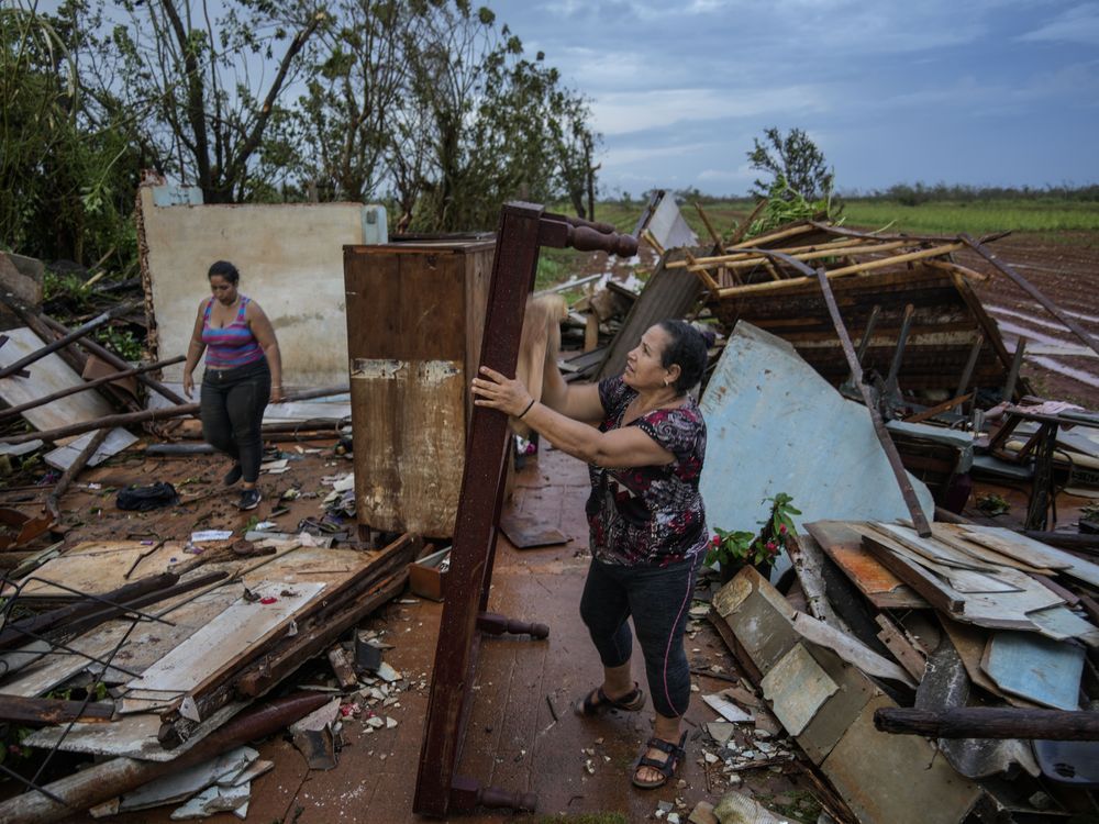 NextImg:Rafael dissolves into a low pressure system in the Gulf of Mexico after hitting Cuba as a hurricane