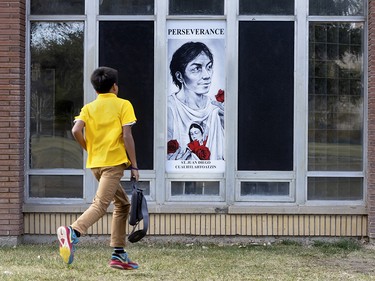 A student passes an image of St. Juan Diego at St. Labre Indian School in Ashland, Montana, Tuesday October 22, 2024.