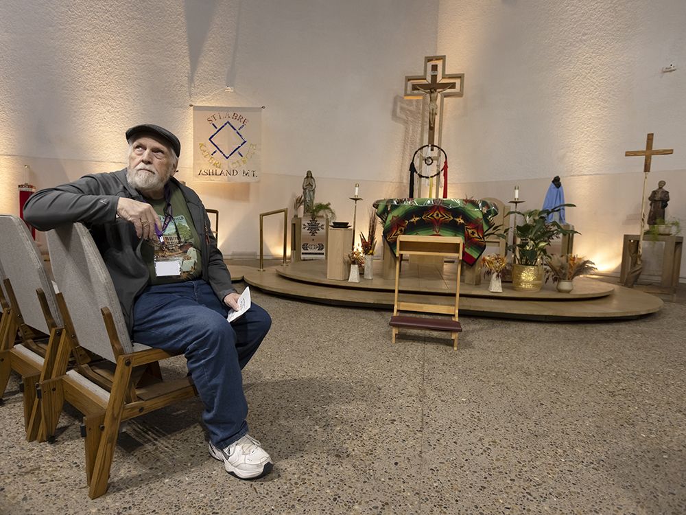 St. Labre Indian School donor Mike Beecher of Meza, Arizona sits in the church at Ashland, Montana, Tuesday October 22, 2024.