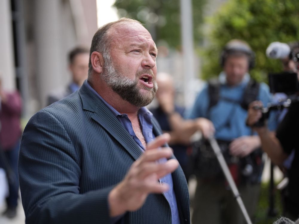 NextImg:The Onion’s bid to buy Infowars goes before a judge