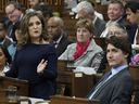Deputy Prime Minister and Minister of Finance Chrystia Freeland presents the federal budget as Prime Minister Justin Trudeau listens in the House of Commons in Ottawa on April 16, 2024.