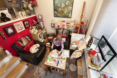 Greeting card artist Heather Jean works on one of her cards in Toronto on Nov. 26, 2024.