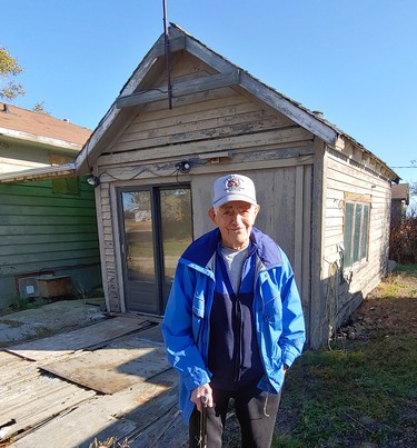 Maury Morrison, outside the former post office in Netherhill, Saskatchewan, where his late wife was postmistress..