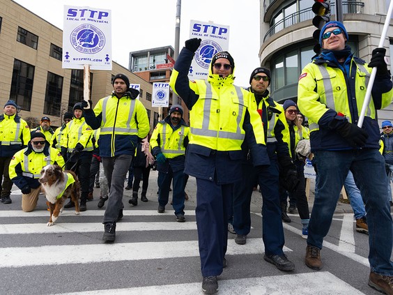 Canada Post strike involving more than 55,000 has hit 25 days Canada Post workers on strike in Montreal
