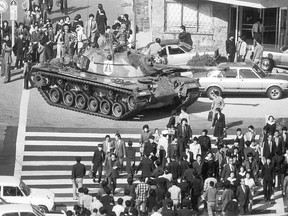 A South Korean army tank patrols the streets of Seoul on Oct. 27, 1979.