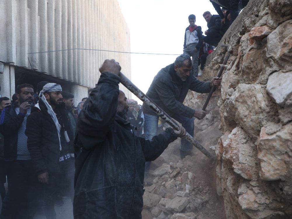 NextImg:'Where is everyone?': Thousands scour Syria's most horrific prison for signs of their loved ones