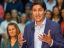 Primer Minister Justin Trudeau, flanked by Minister of Finance Christina Freeland make an announcement on Sept. 14, 2023.
