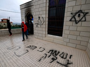 Graffiti on the outside of a mosque.