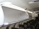 An empty overhead bin on a Bombardier Q400 turboprop aircraft. Air Canada says its lowest tier will no longer allow carry-on bags.