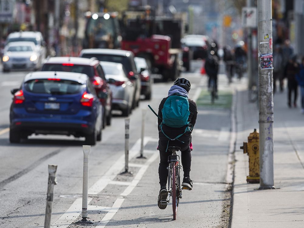 NextImg:Ontario plan to remove some bike lanes sparks rights challenge by cyclists