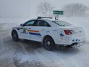 An RCMP cruiser sits parked near the Canada/United States border crossing at Emerson, Manitoba, in February 2022.