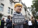 A person dressed as Boris Johnson holds a guilty sign as the U.K. Supreme Court rules that the prorogation of Britain's Parliament was unlawful on Sept. 24, 2019 in London, England. Justin Trudeau's prorogation is facing a similar challenge.