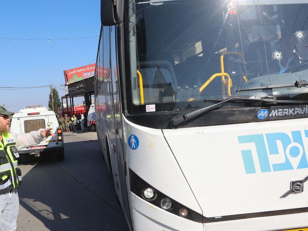 Terrorists open fire at a bus carrying Israelis killing 3 and injuring 7