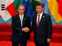 Mark Carney, left, shakes hands with Chinese President Xi Jinping at the G20 Summit in Hangzhou, China, in 2016.