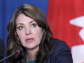 Alberta premier wants review of private health-care clinics contracts Alberta premier wants review of private health-care clinics contracts