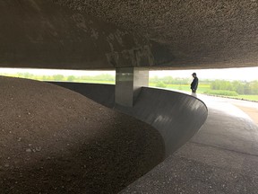 A man views a monument.
