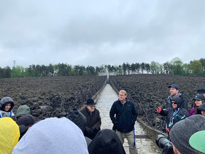 People view a monument.