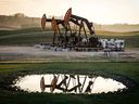 Pumpjacks draw out oil and gas from well heads near Calgary. The U.S. depends on Canada for 60 per cent of its oil imports.