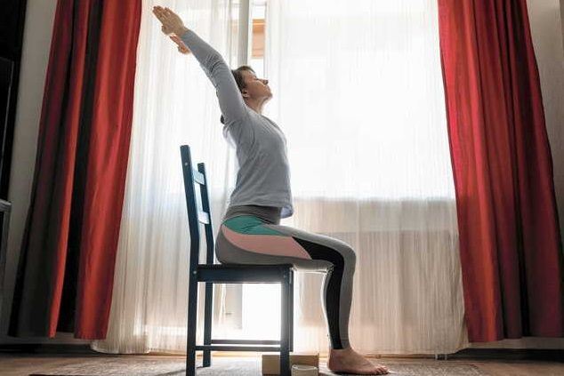 NextImg:Senior Living: The benefits of doing yoga with a chair