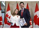 Better days: Justin Trudeau and Chrystia Freeland pose before tabling of the Fall Economic Statement in in 2022. After today's announcement she responded tersely on X, thanking him for his service.