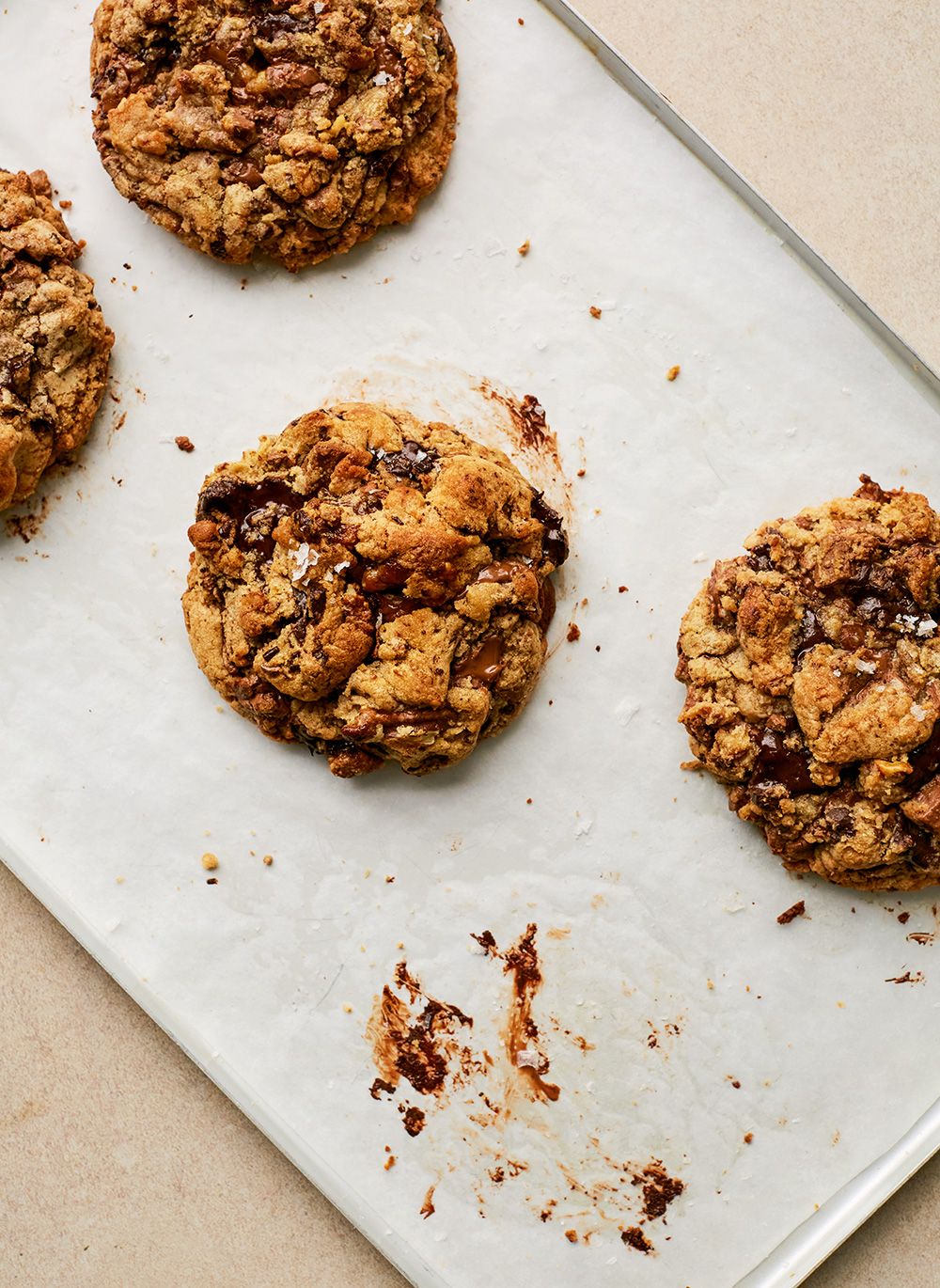  When Nicola Lamb lived in New York, she travelled 70 blocks to get one of Levain Bakery’s “unashamedly thick cookies.” These miso walnut double-thick chocolate-chip cookies are her take on the gooey treat.