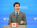 Perdana Menteri Justin Trudeau mengadakan konferensi pers di Warsawa, Polandia, pada 28 Januari.