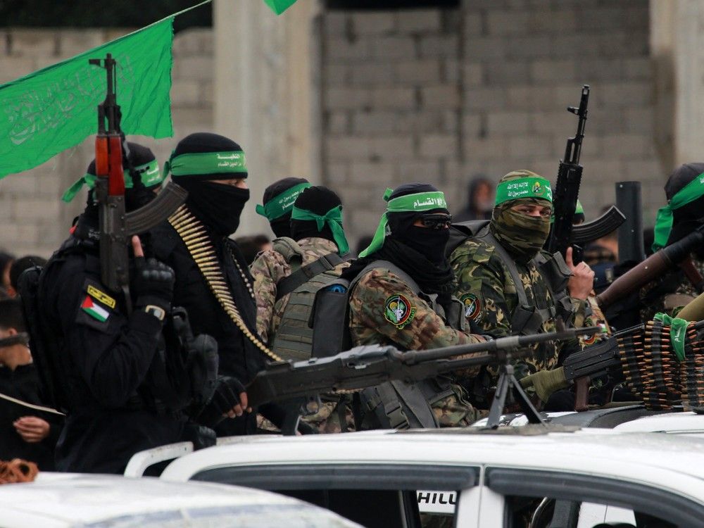 NextImg:Hamas agrees 'in principle' to free four bodies early: report