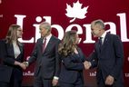 (L/R) Karina Gould, former House Leader, Frank Baylis, former Liberal MP, Chrystia Freeland, former Finance Minister and Deputy Prime Minister of Canada, and Mark Carney, Former governor of the bank of Canada pose for a picture before the second night of the Liberal Leadership Debate in the federal Liberal leadership race to replace Canadian Prime Minister Justin Trudeau at the MELS studios in Montreal, Canada, on February 25, 2025.