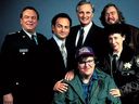 Michael Moore (front) with the cast of Canadian Bacon, from left, Rip Torn, Kevin Pollak, Alan Alda, John Candy and Rhea Perlman.