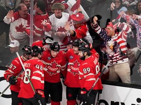 Canadian players celebrate.
