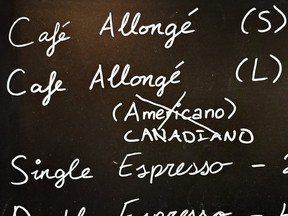 Americano crossed out and replaced by Canadiano on a café menu chalk menu board