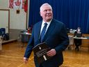 Progressive Conservative Leader Doug Ford prepares to vote in the Ontario provincial election, at Westmount Junior School in Etobicoke, Ont., on Thursday, Feb. 27, 2025.