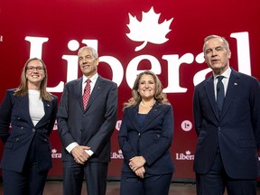 Karina Gould, Frank Baylis, Chrystia Freeland and Mark Carney.