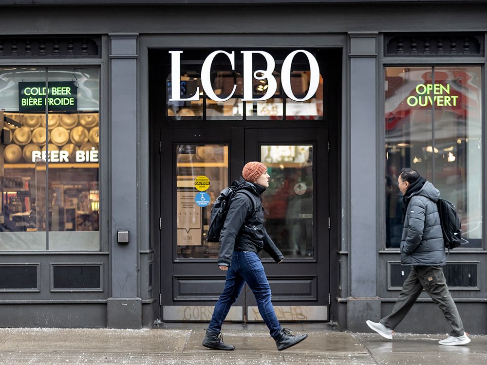 NextImg:Canadians rush to buy American alcohol before provinces strip U.S. brands from shelves over tariffs