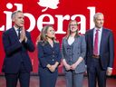 From left: Federal Liberal leadership candidates Mark Carney, Chrystia Freeland, Karina Gould and Frank Baylis before their French-language debate in Montreal, on Feb. 24, 2025.
