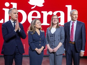 Mark Carney, Chrystia Freeland, Karina Gould and Frank Baylis.