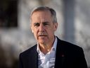 Mark Carney, candidate for the leadership of the Liberal Party of Canada, speaks during a news conference in Vancouver, Thursday, Feb. 13, 2025.