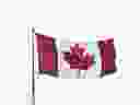 A Canadian flag blows in the wind, Wednesday February 12, 2025.