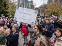 People take part in a Stop Jewish Hatred event outside the TDSB headquarters on Yonge Street, Tuesday, Sept. 24, 2024.